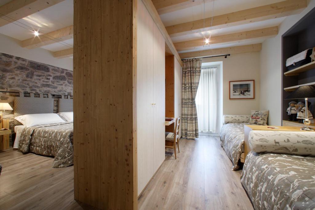 Hotel Savoia Dal 1924 San Martino Di Castrozza Kamer foto